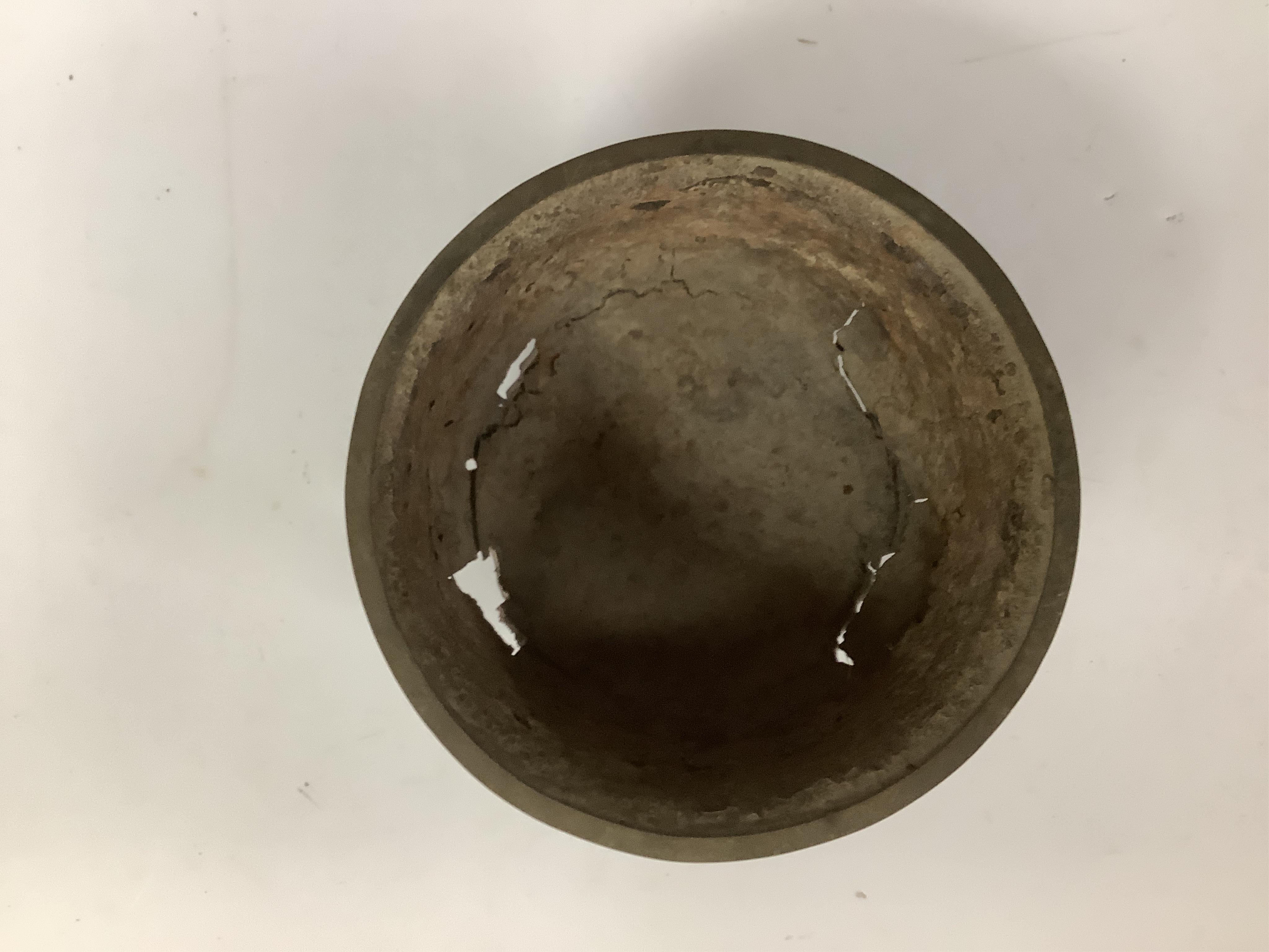 An 18th/19th century Chinese cinnabar lacquer bowl, on carved hongmu stand and a Chinese pierced brass disc. Condition - poor